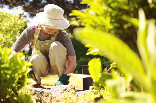 Happy homeowner with a well-maintained lawn